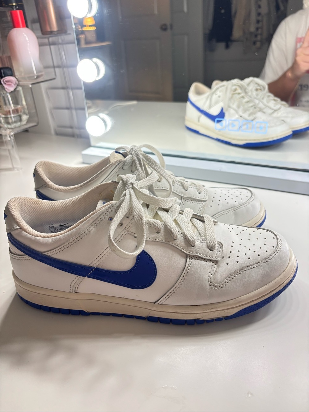 Nike women’s white Sneakers with Blue Swoosh